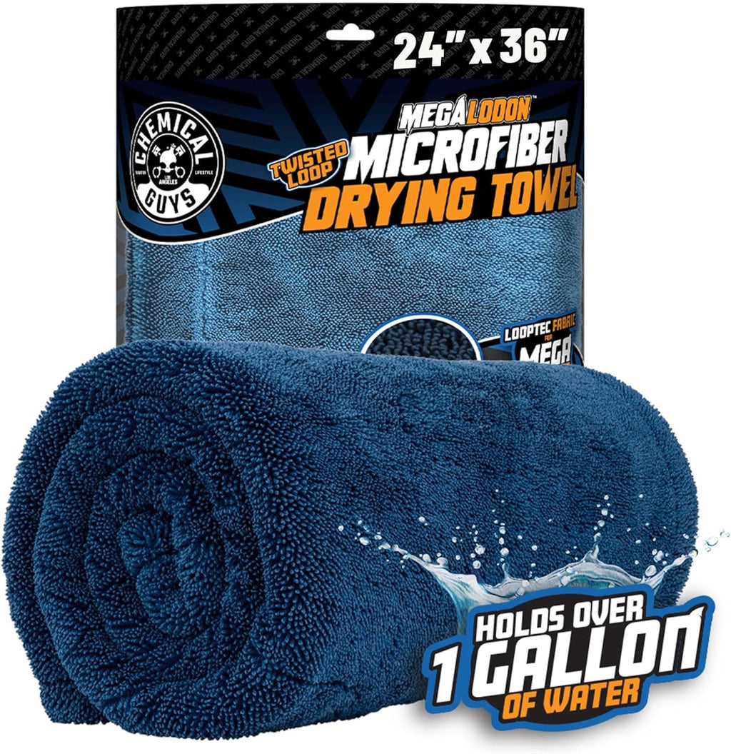 Rolled dark blue Chemical Guys Megalodon Twisted Loop Microfiber Drying Towel in front of retail packaging - 24" x 36", holds over 1 gallon of water