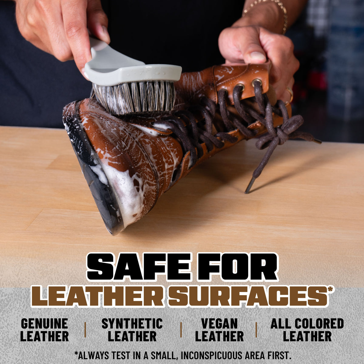 Nifty Leather Cleaning Brush scrubbing brown leather boot - safe for leather surfaces: genuine leather, synthetic leather, vegan leather, and all colored leather
