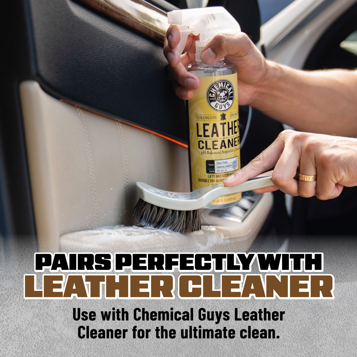 Nifty Leather Cleaning Brush with Chemical Guys Leather Cleaner spray bottle on car seat - pairs perfectly with leather cleaner for the ultimate clean