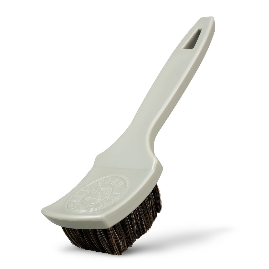 Nifty Leather Cleaning Brush with light gray handle and dark brown synthetic horsehair bristles, front angled view