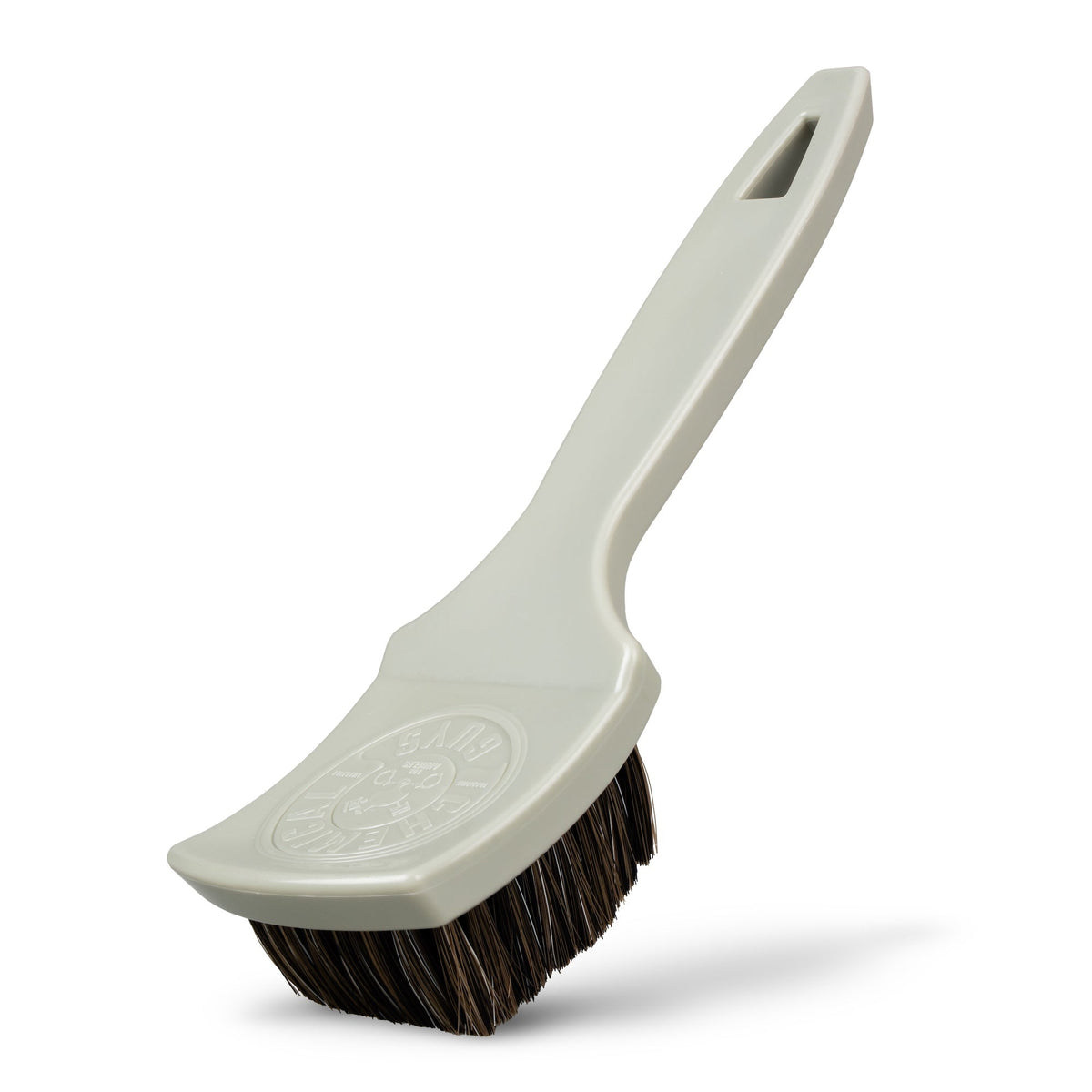 Nifty Leather Cleaning Brush with light gray handle and dark brown synthetic horsehair bristles, front angled view