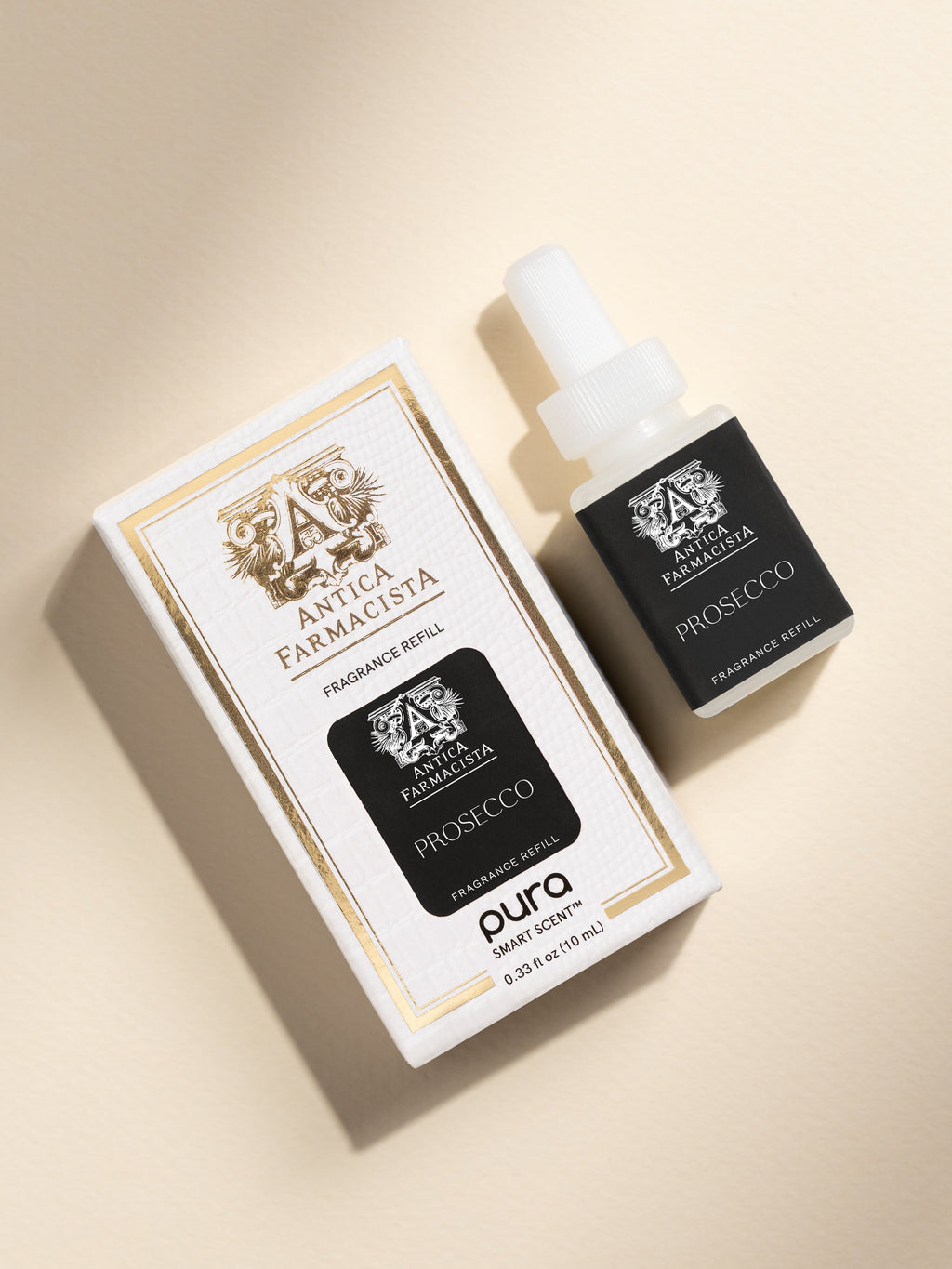 Antica Farmacista Prosecco fragrance vial and packaging on a beige background