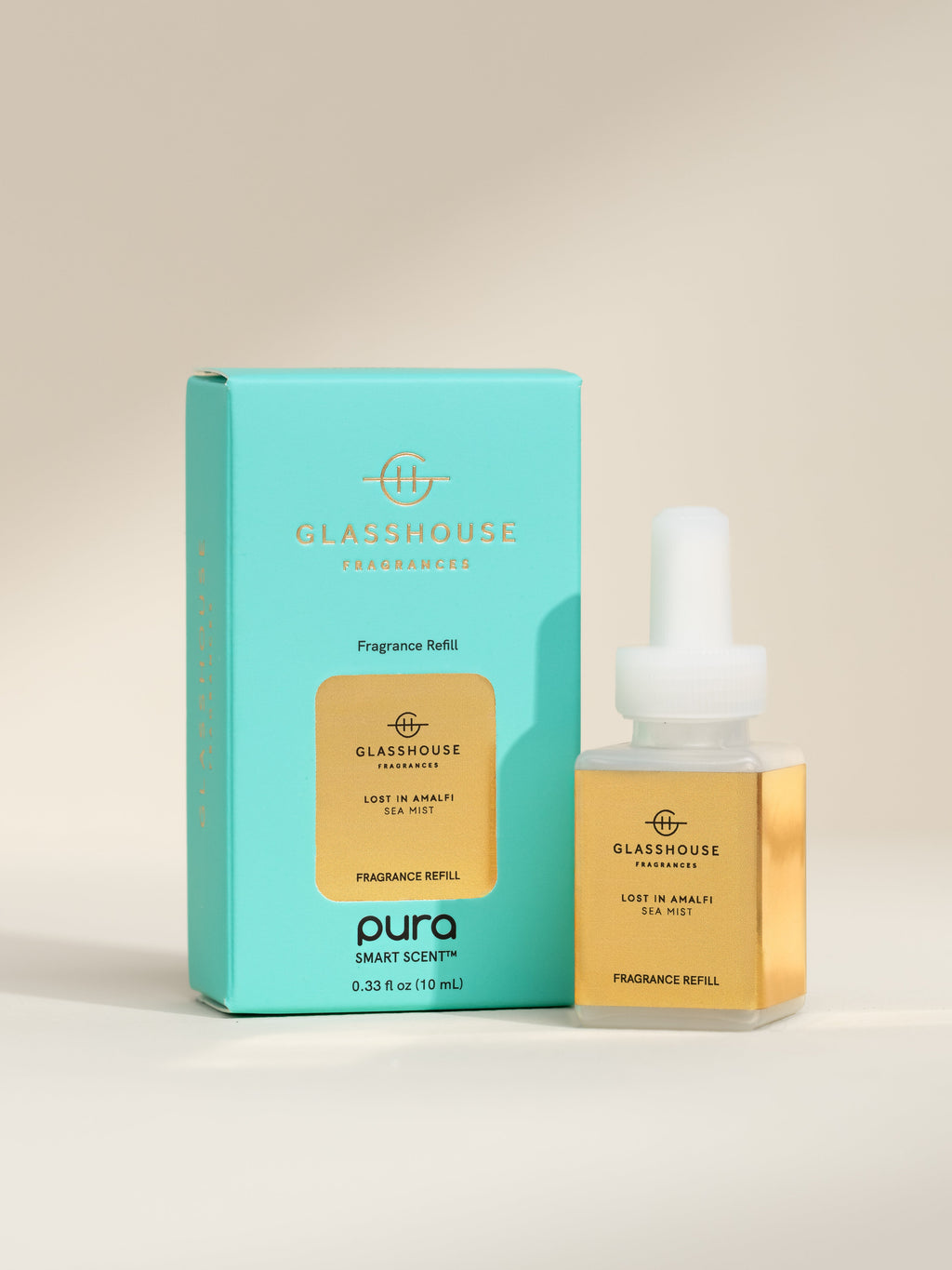 Glasshouse Fragrances Lost in Amalfi fragrance vial and packaging on a beige background