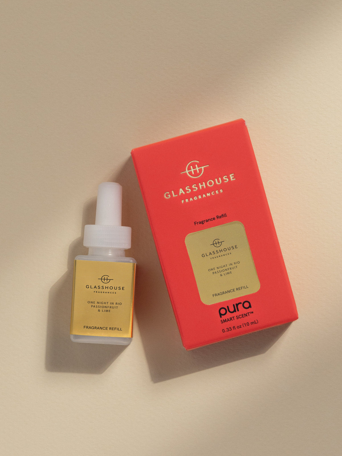 Glasshouse Fragrances One Night in Rio fragrance vial and packaging on a beige background