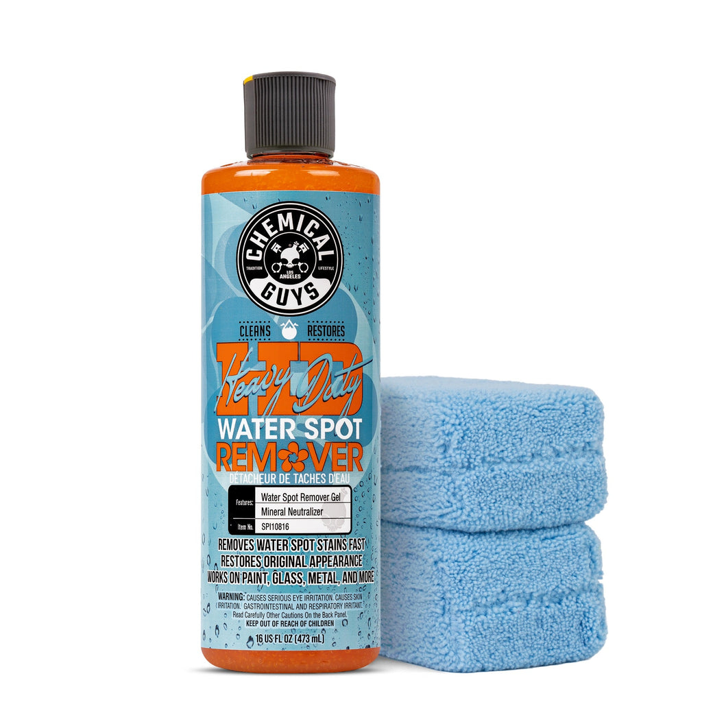 Bottle of Chemical Guys Heavy Duty Water Spot Remover with two blue folded microfiber towels on white background