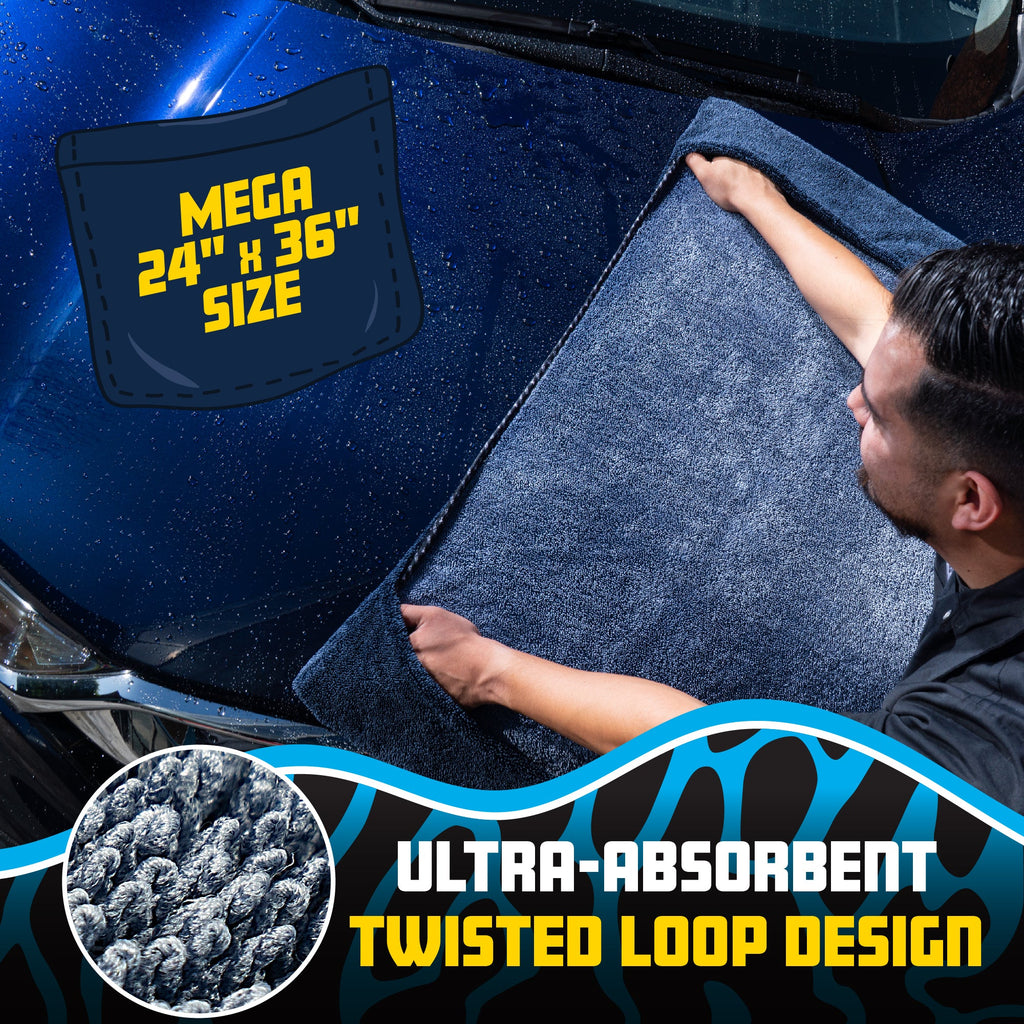 Man placing large dark blue Megalodon Pocket Grip drying towel onto car hood - mega 24" x 36" size, ultra-absorbent twisted loop design
