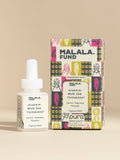 Malala Fund Nigeria Hope for Tomorrow fragrance vial and packaging on a beige background