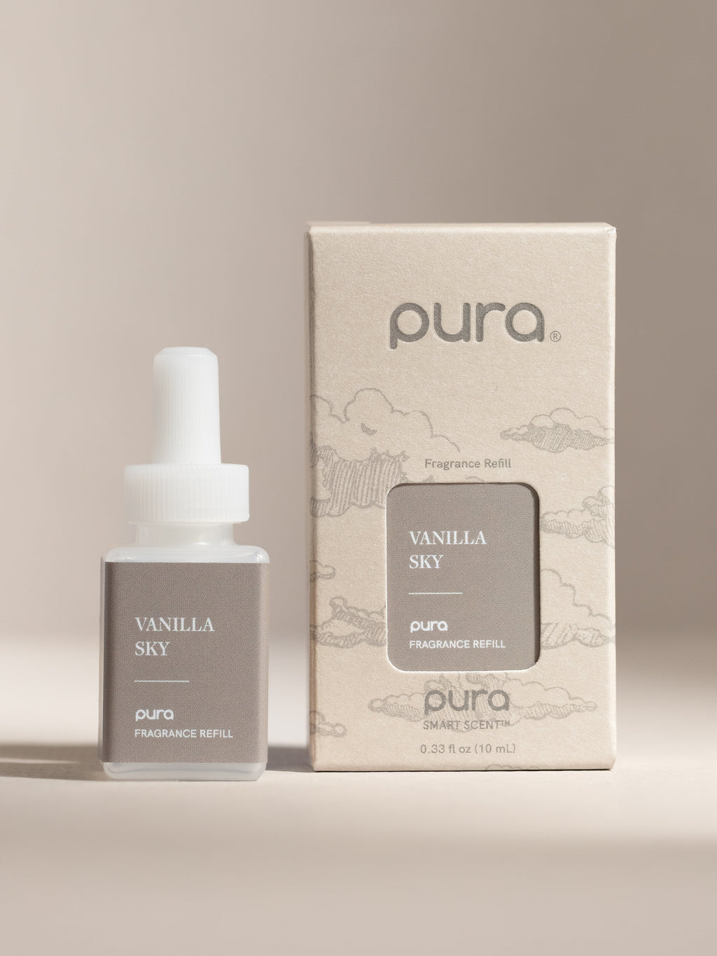 Pura Vanilla Sky fragrance vial and packaging on a beige background