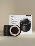 Pura Car Pro diffuser, Cozy Cashmere car fragrance, and packaging on a beige background