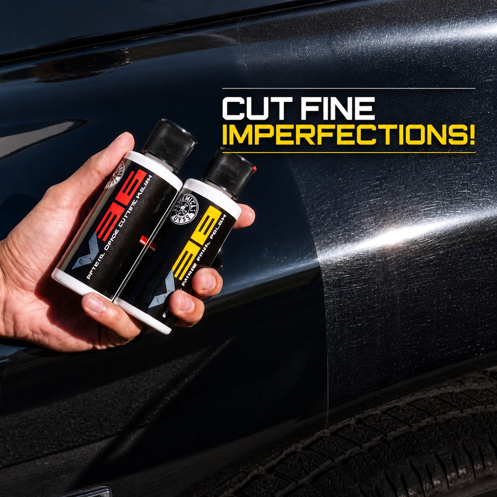 Hand holding TORQ V36 Cutting Polish and V38 Finishing Polish bottles over black car paint - cut fine imperfections